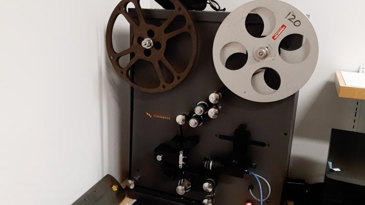 Machine with two reels used for scanning film.